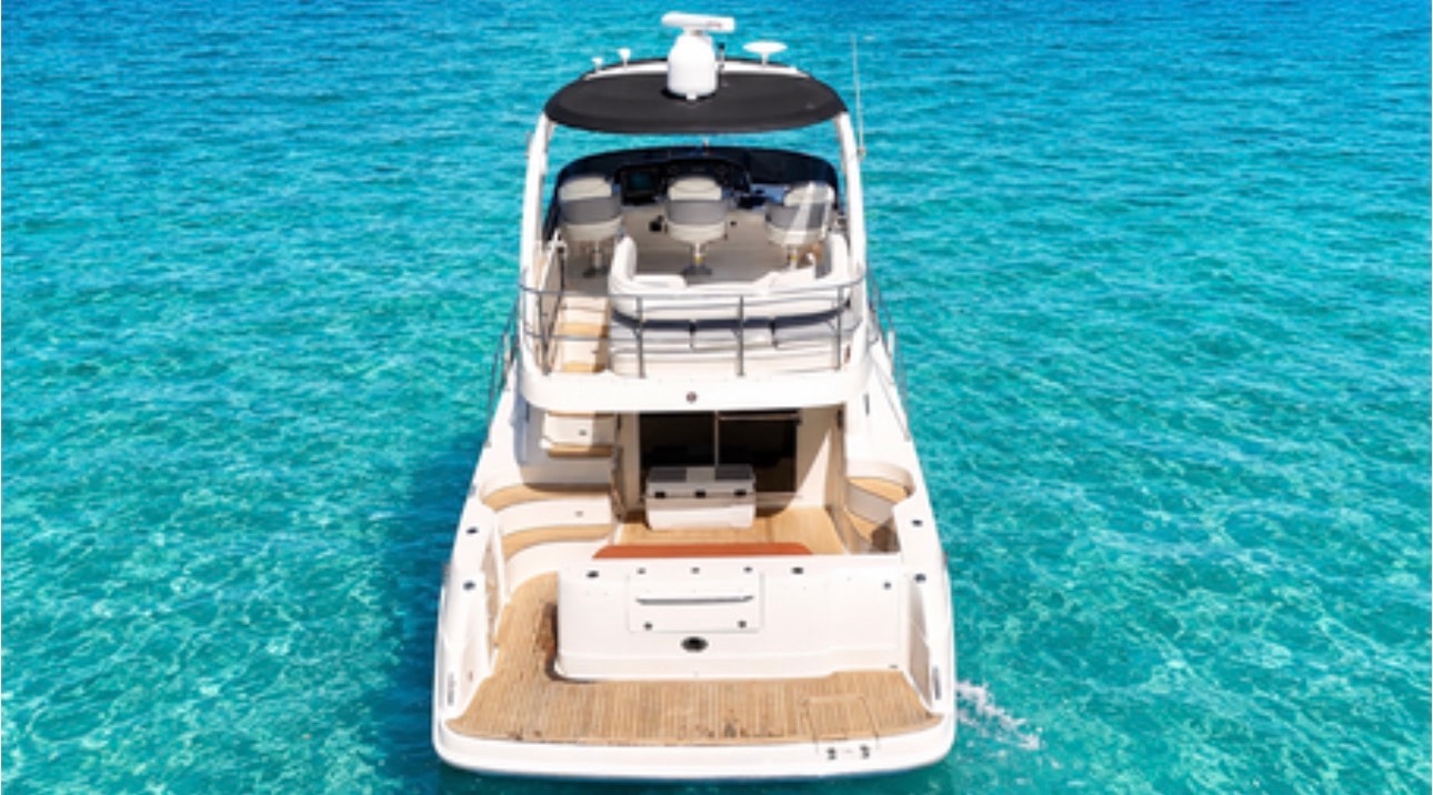 "BLUE" Sea Ray 50GT aerial stern aft deck turquoise water
