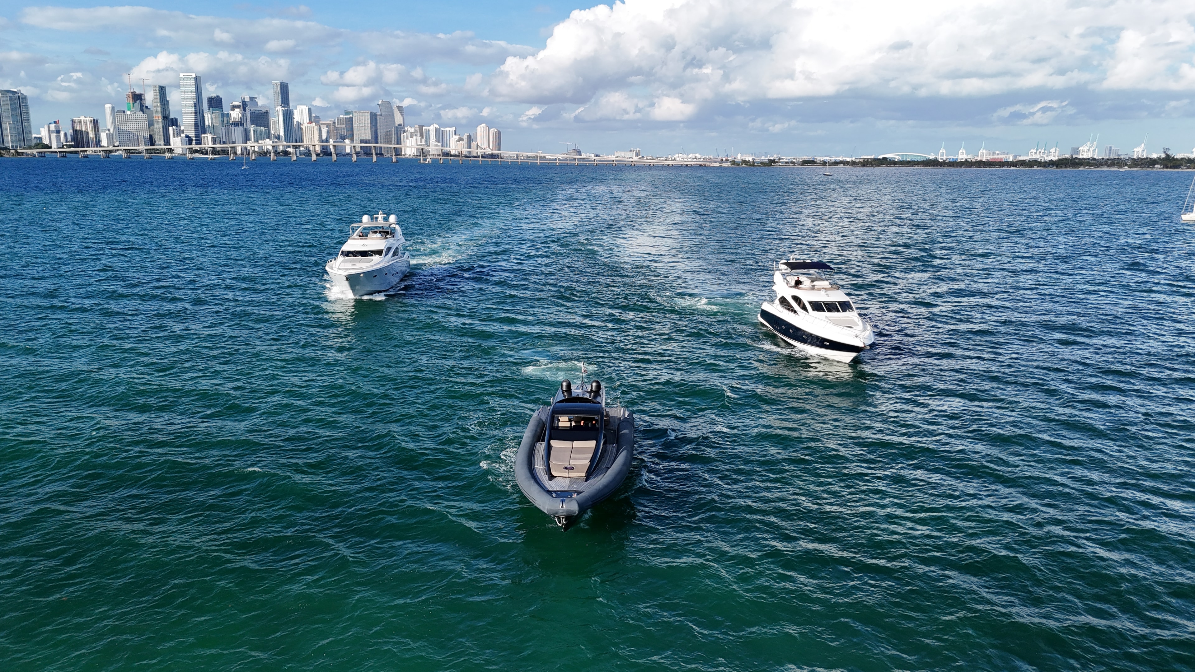 DEEP BLUE yacht on water near the Miami skyline