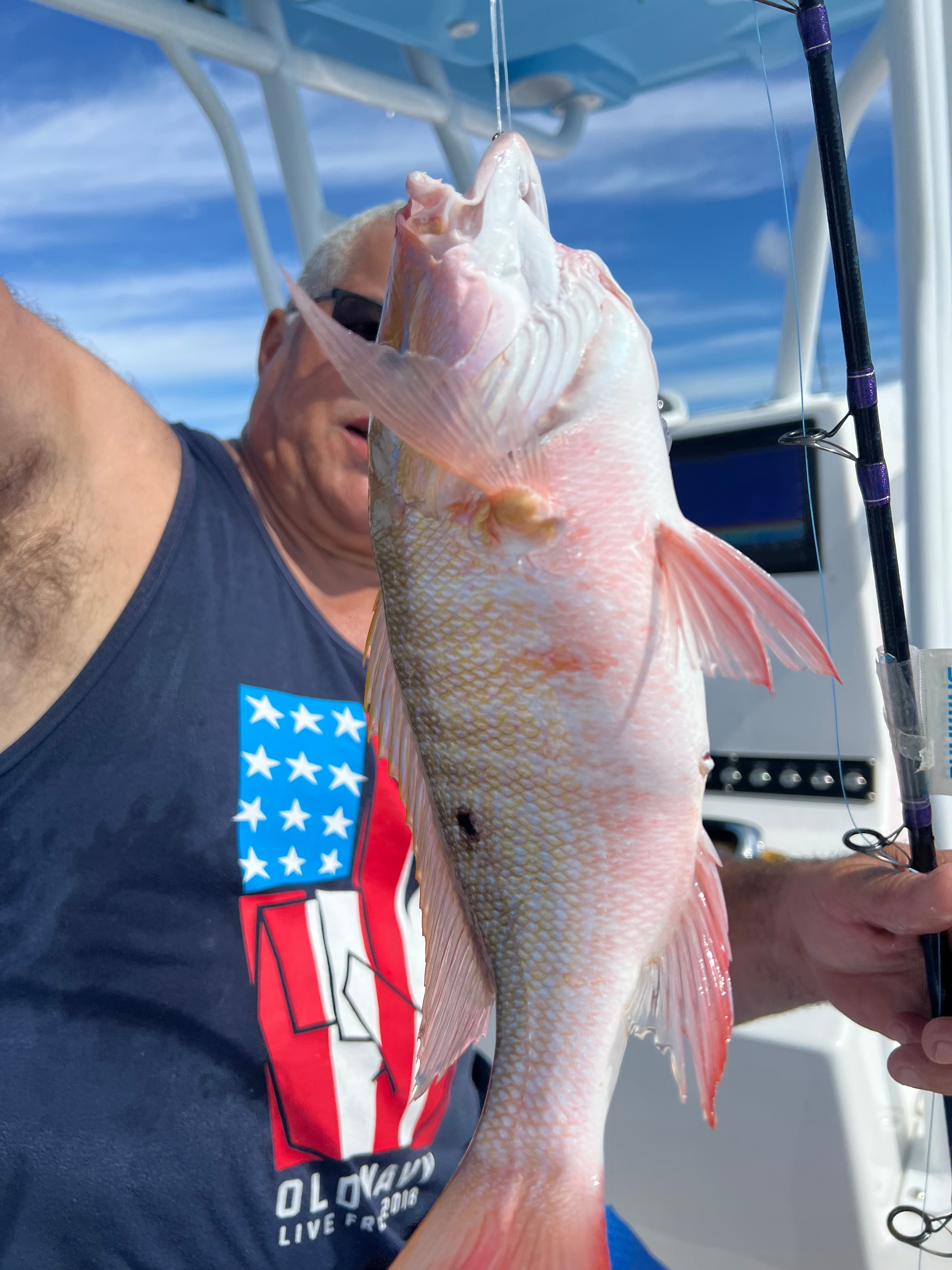 Close-up of a large red snapper caught on a Miami fishing charter aboard the Mako 30ft