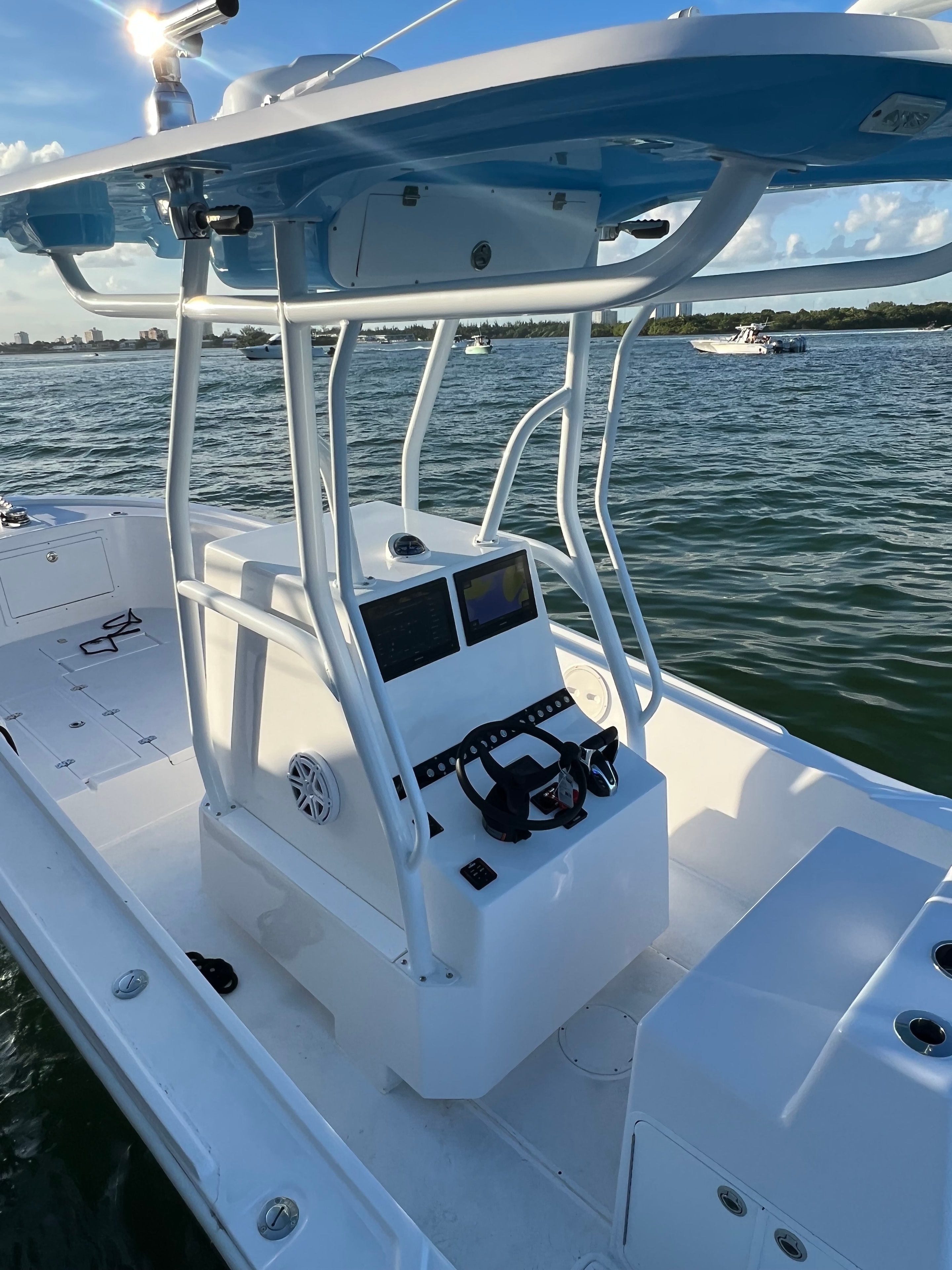 Guests aboard the Mako 30ft at a Miami sandbar