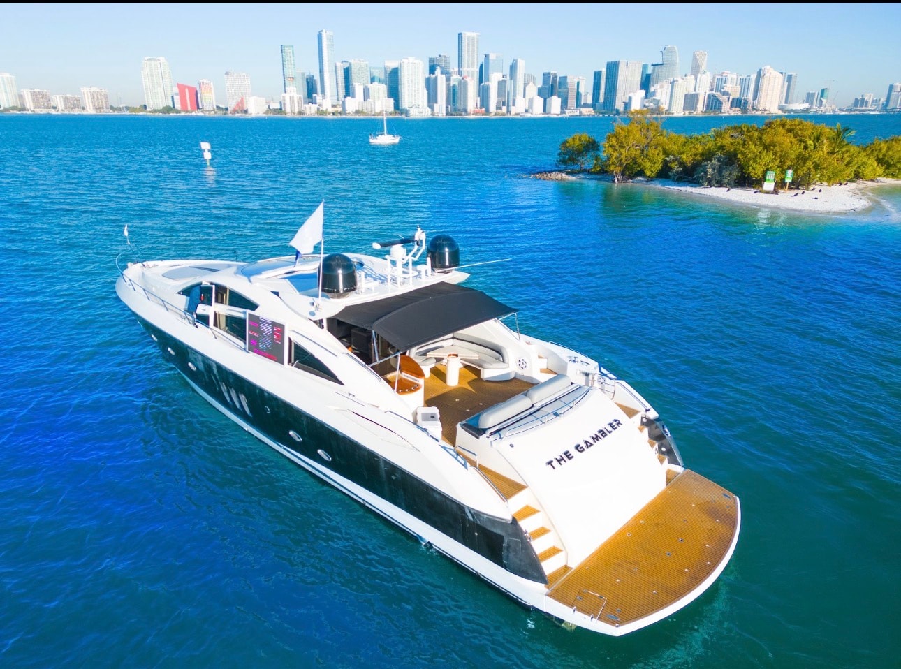 PREDATOR 82ft Sunseeker aerial view with Miami skyline backdrop