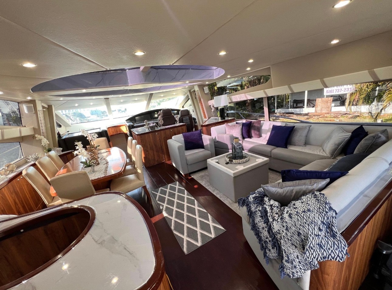 PREDATOR 82ft Sunseeker interior salon and dining area with skylight