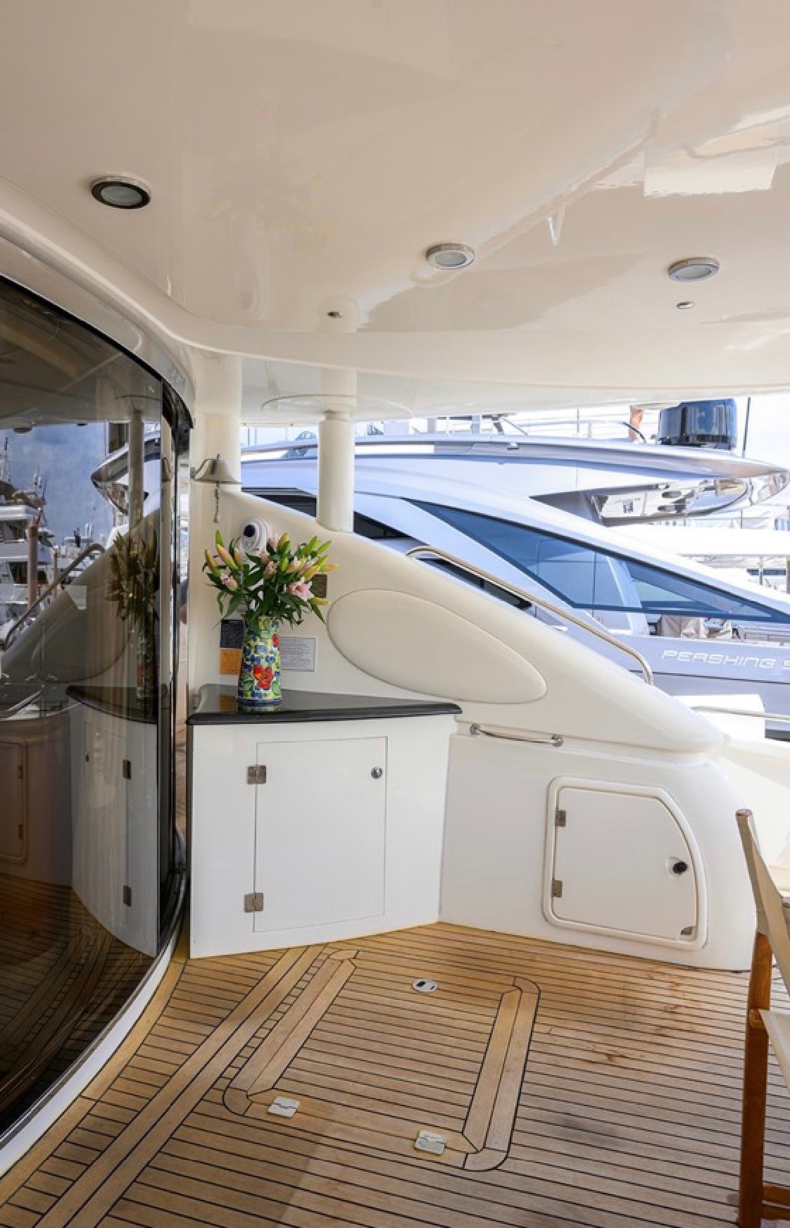 Sunseeker 88ft starboard aft deck at marina — spacious exterior areas