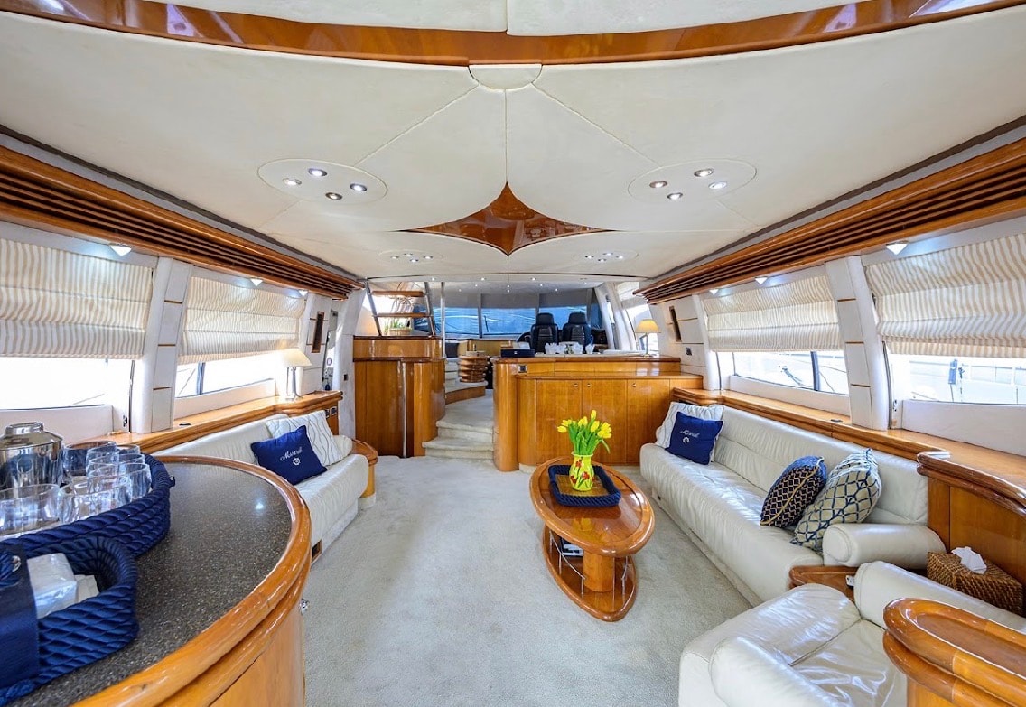 Sunseeker 88ft wide salon lounge with wood accents and panoramic windows